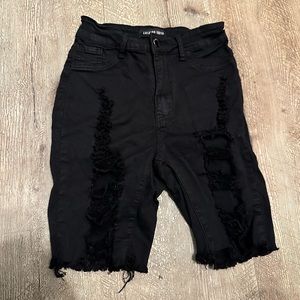 Fashion Nova Black distressed shorts